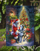 Alaskan Malamute and Santa Claus Garden Flag